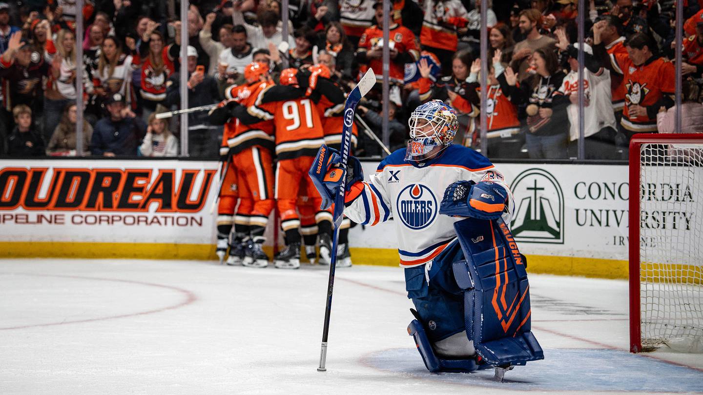 Apr 26, 2026; Anaheim, California, USA; Anaheim Ducks celebrate a goal while Edmonton Oilers goaltender Tristan Jarry (35) looks at the replay during the second period in game four of the first round of the 2026 Stanley Cup Playoffs at Honda Center. Mandatory Credit: Corinne Votaw-Imagn Images