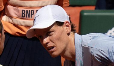 Jannik Sinner speaks with chair umpire Aurelie Tourte at the French Open