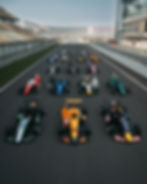 Racers stand by their colorful cars on a race track. Background features grandstands and a modern building, conveying a competitive atmosphere.