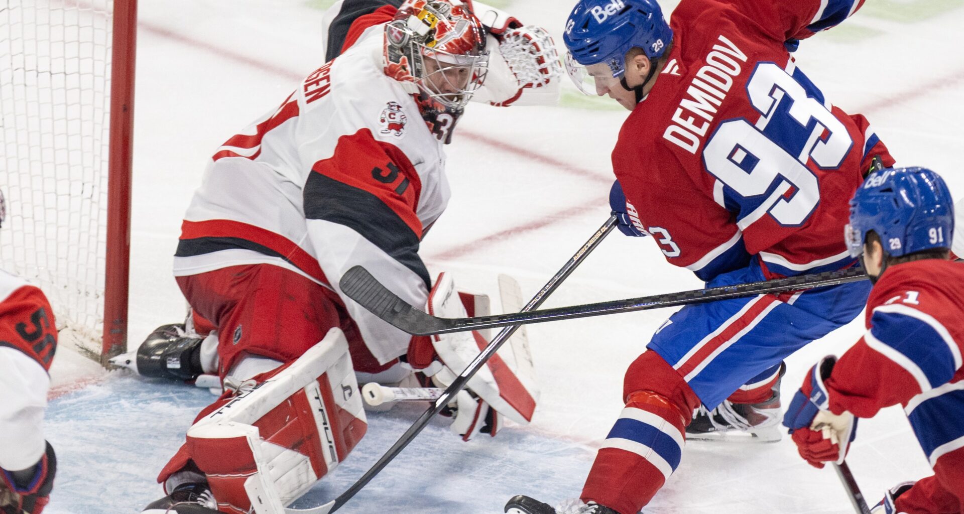 Montreal Canadiens' Ivan Demidov has his shot stopped by Carolina Hurricanes' Frederik Andersen in the crease