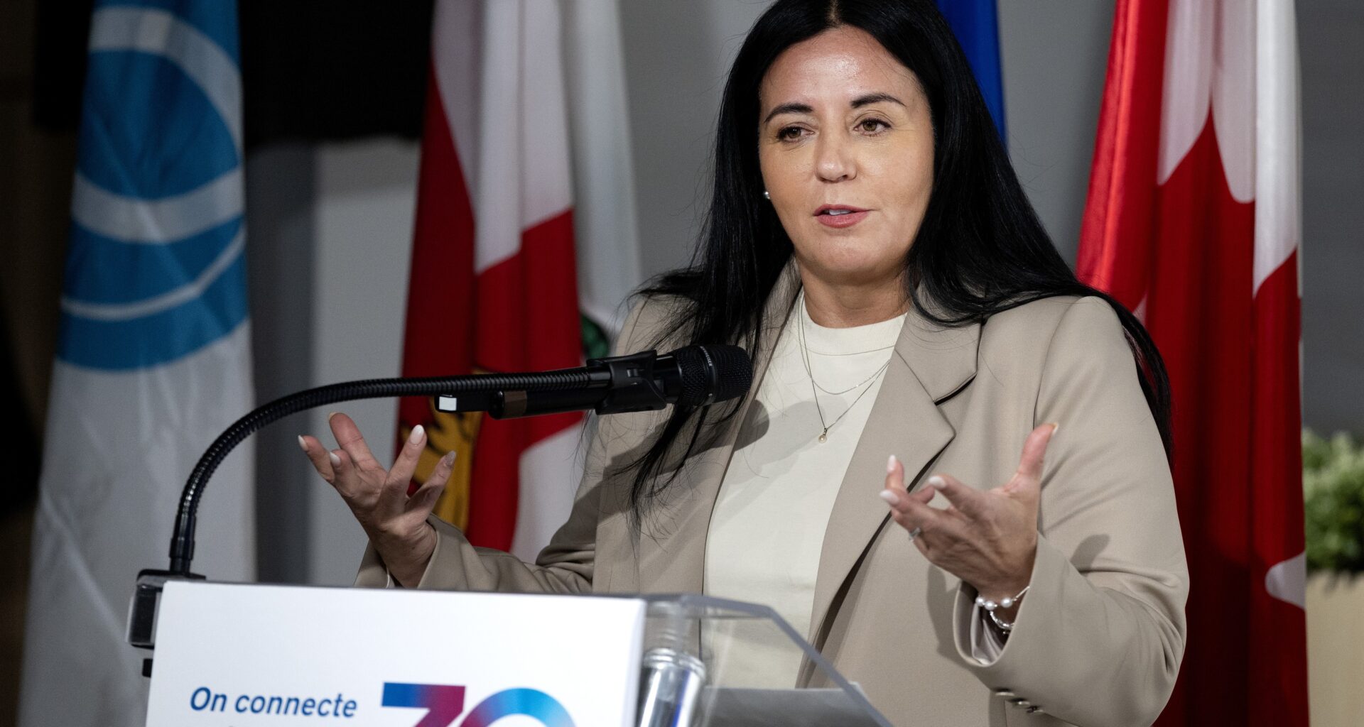 Montreal Mayor Soraya Martinez Ferrada gestures while speaking at a lectern.