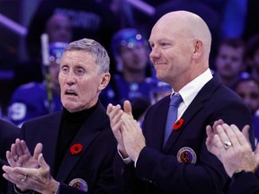 Mats Sundin (right) stands with Borje Salming