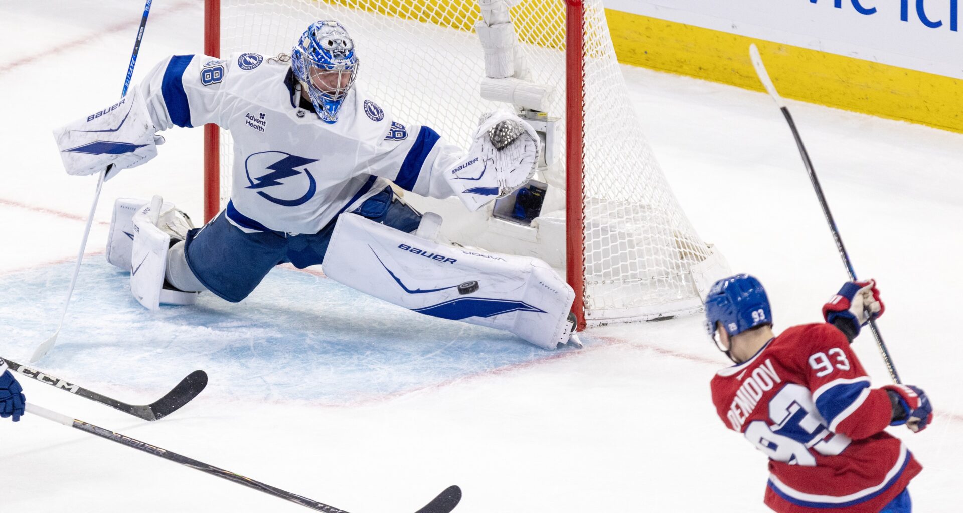 Lightning goalie Andrei Vasilevskiy slides to his left across his crease to make a nice pad save on Canadiens