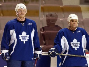 Mats Sundin (left) and Tie Domi of the Toronto Maple Leafs at a practice in 2006.