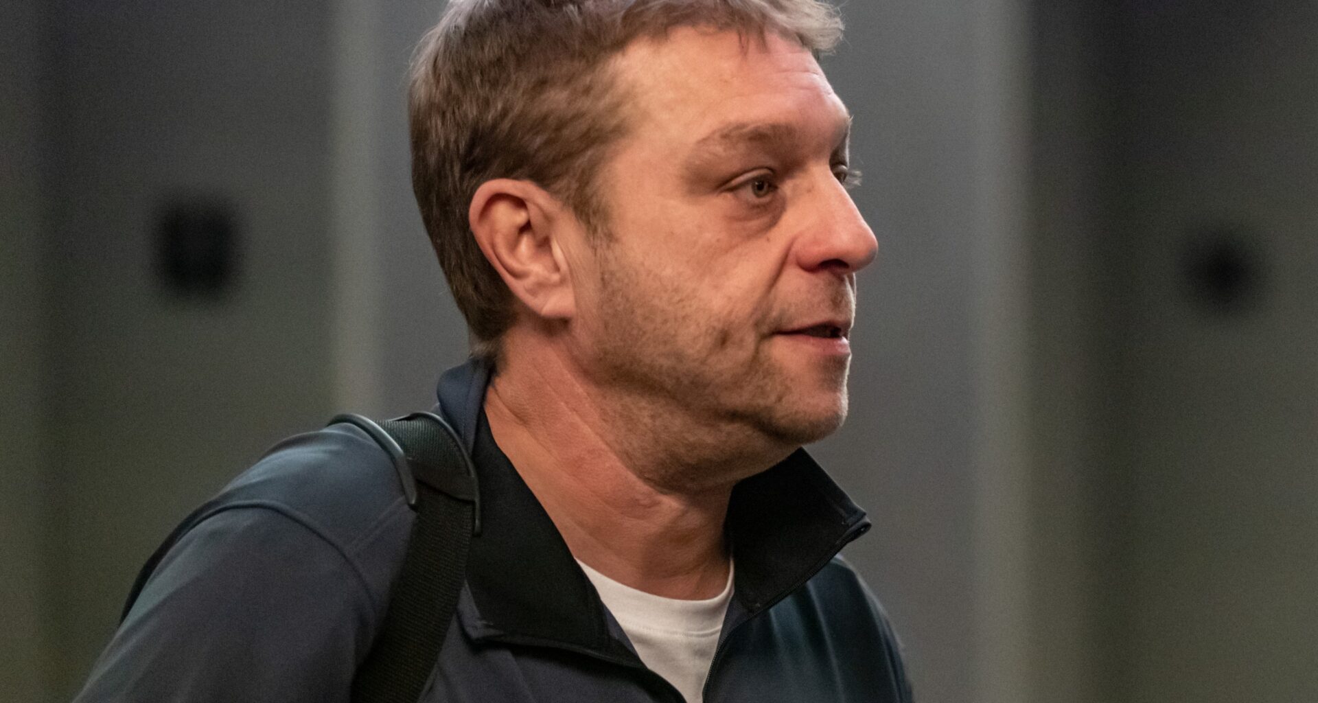 Side view of man in courthouse
