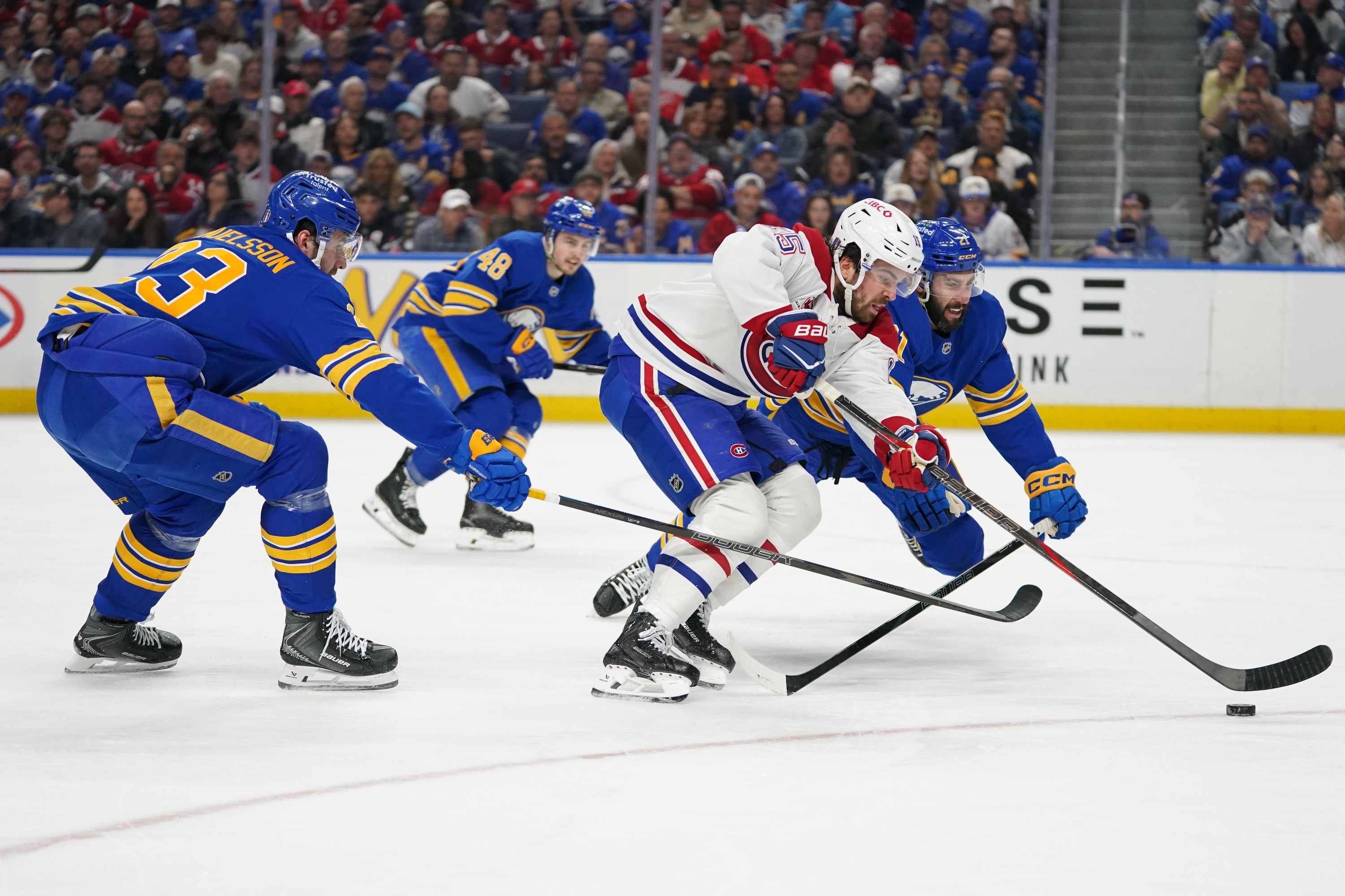 Hockey player knives through the defence.