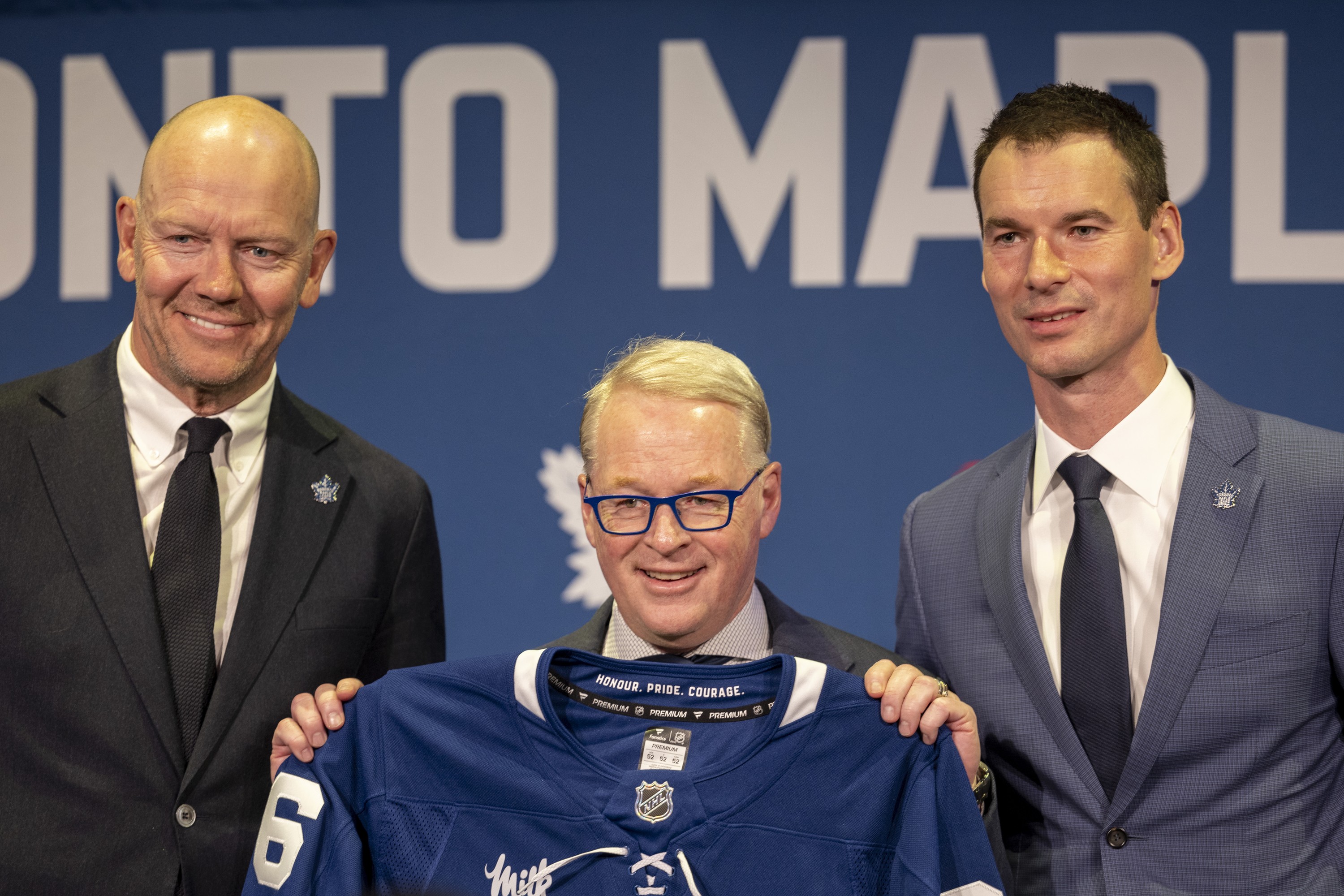 MLSE president and CEO Keith Pelley is flanked by Maple Leafs executive adviser Mats Sundin, left, and general manager John Chayka during a news conference in Toronto on Monday.