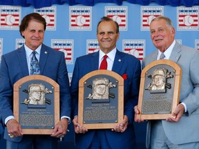 Inductees, from left, Tony La Russa, Joe Torre and Bobby Cox