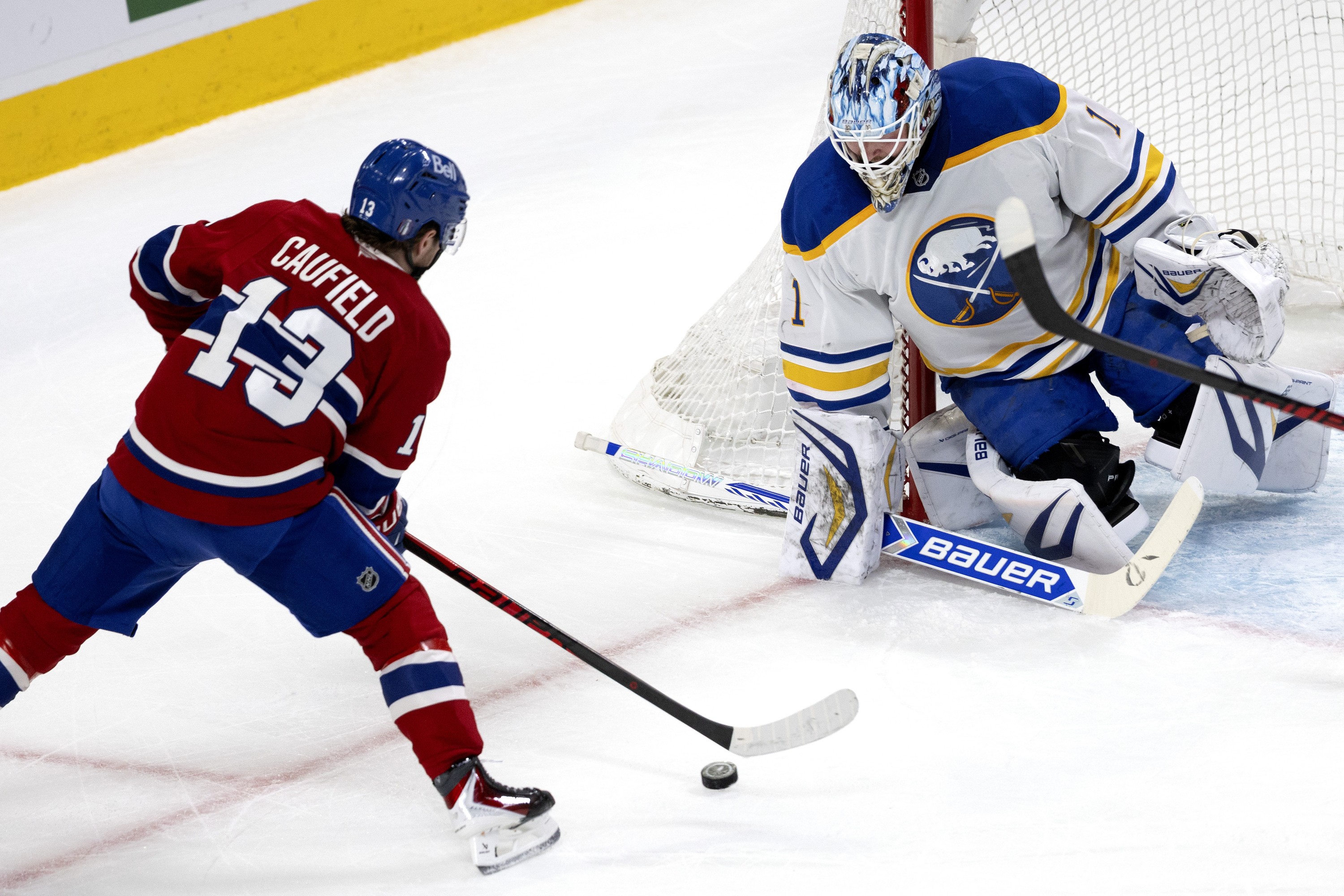 Cole Caufield prepares to shoot on the Buffalo Sabres net.