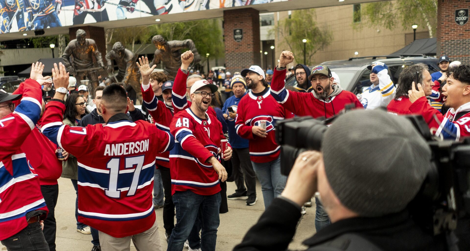 Crowd of people wearing Montreal Canadiens jerseys