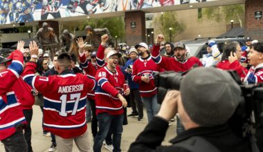 Crowd of people wearing Montreal Canadiens jerseys