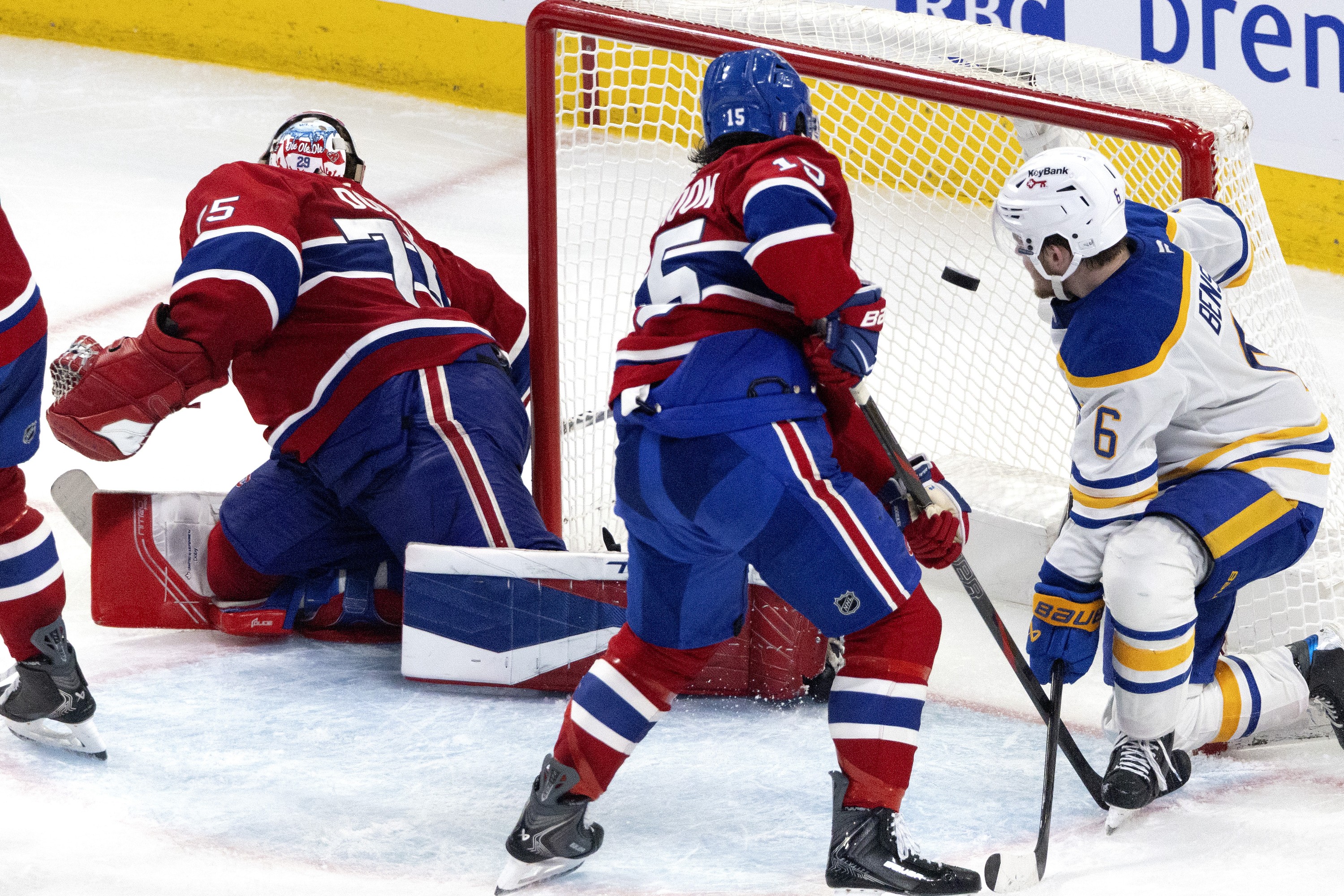 Buffalo Sabres left wing Zach Benson watches the puck sail past Montreal Canadiens goaltender Jakub Dobes.