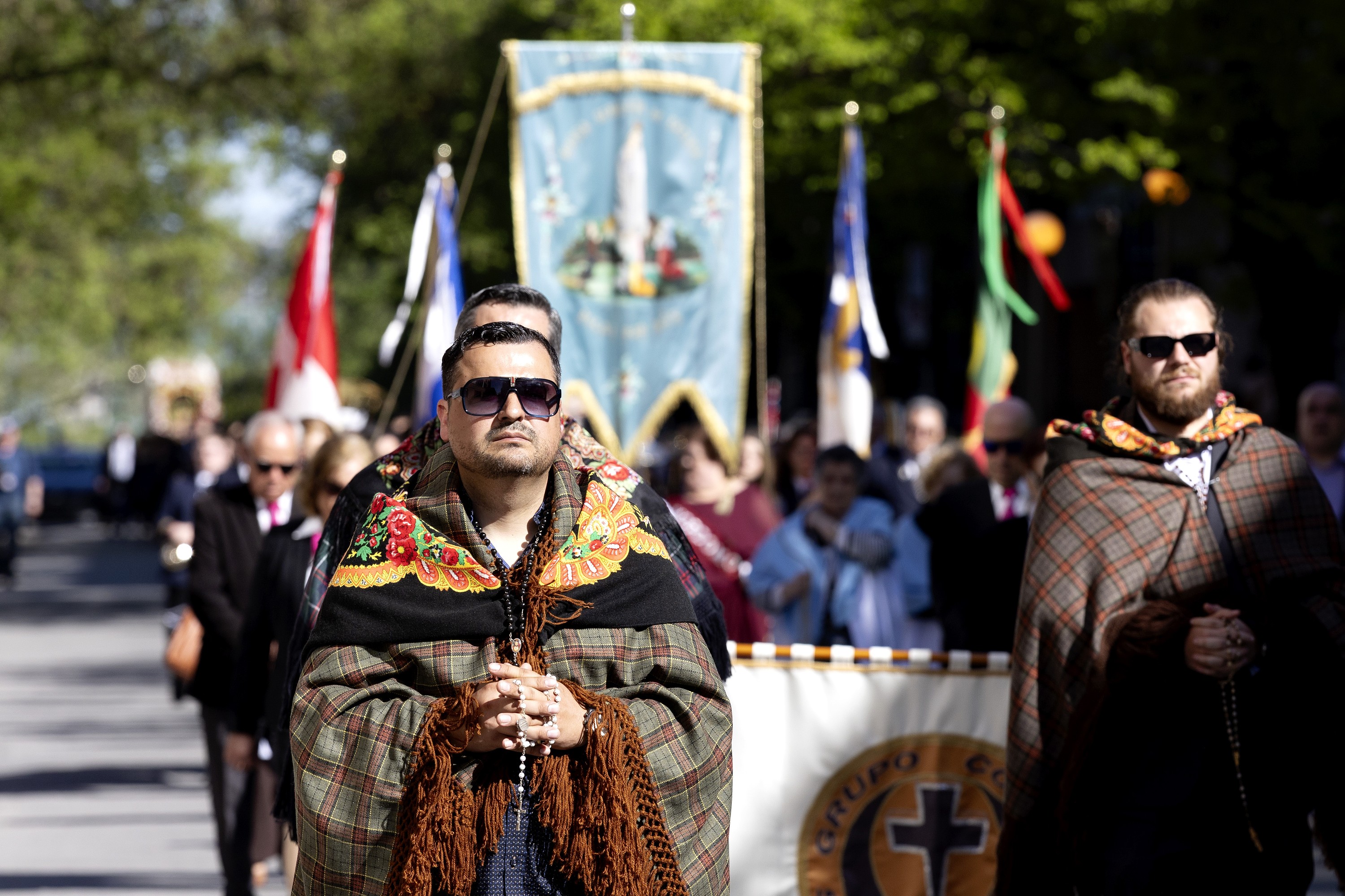 People take part in the annual Portuguese Santo Cristo procession in Montreal.