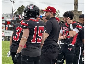 Cornwall Wildcats players and coaches on the sideline