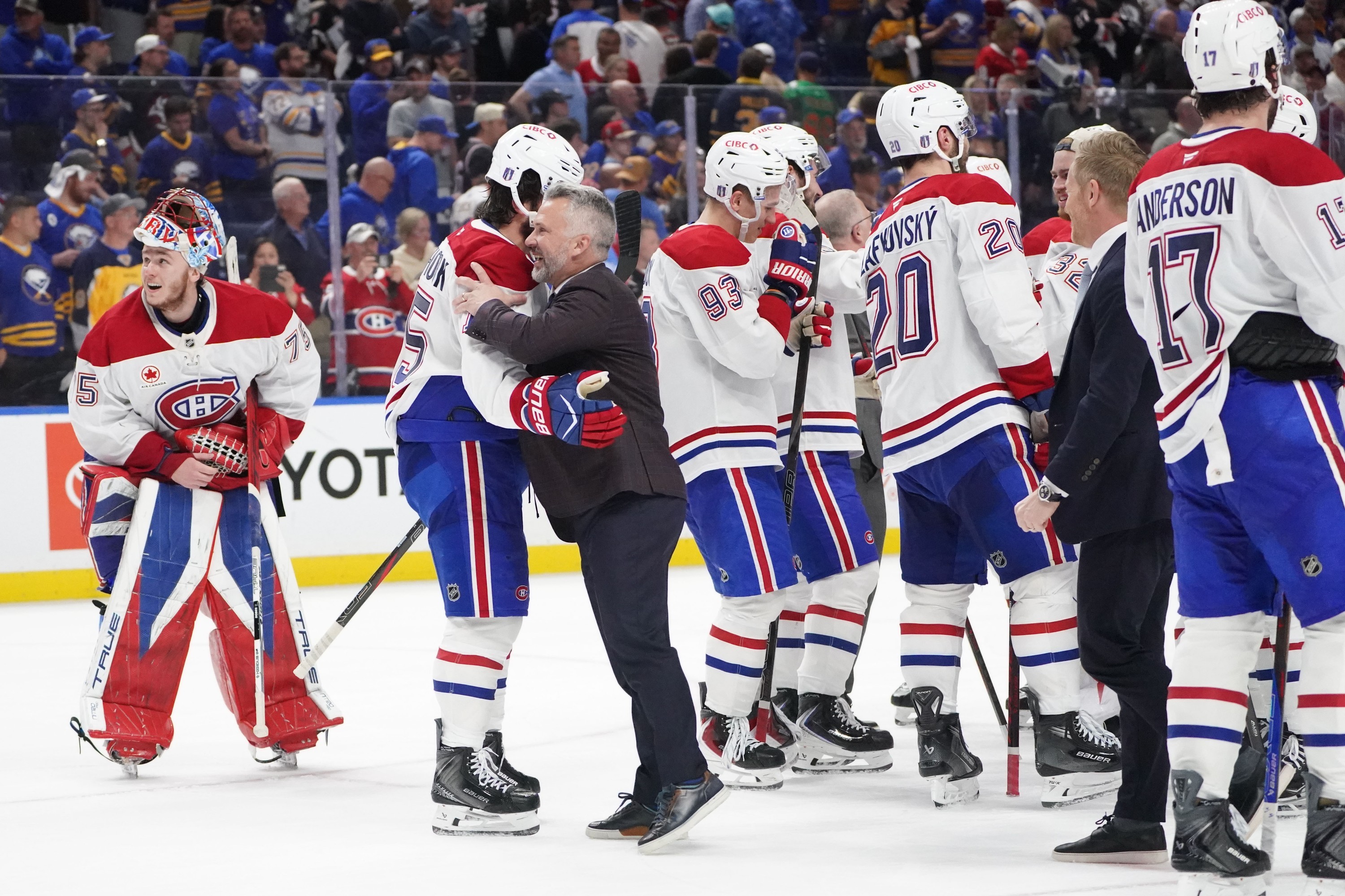 The Montréal Canadiens celebrate their overtime win over the Buffalo Sabres in Game 7 at KeyBank Center in Buffalo on Monday night.