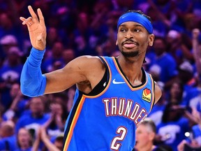 Shai Gilgeous-Alexander of the Oklahoma City Thunder reacts after scoring during the fourth quarter of Game 7 against the Denver Nuggets.