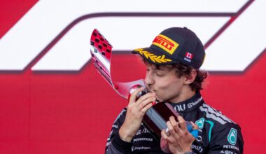Mercedes driver Kimi Antonelli kisses his trophy after winning the Canadian Grand Prix.