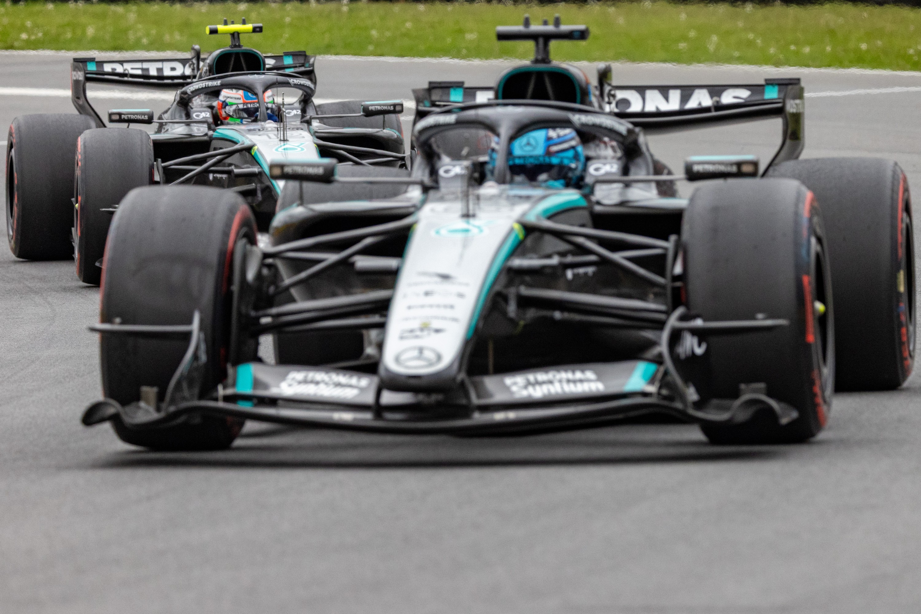 Mercedes driver Kimi Antonelli hunts down teammate George Russell on the racetrack.