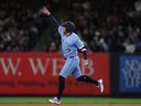 George Springer of the Toronto Blue Jays reacts after hitting a solo home run during the seventh inning against the New York Yankees at Yankee Stadium on May 21, 2026 in New York City. 