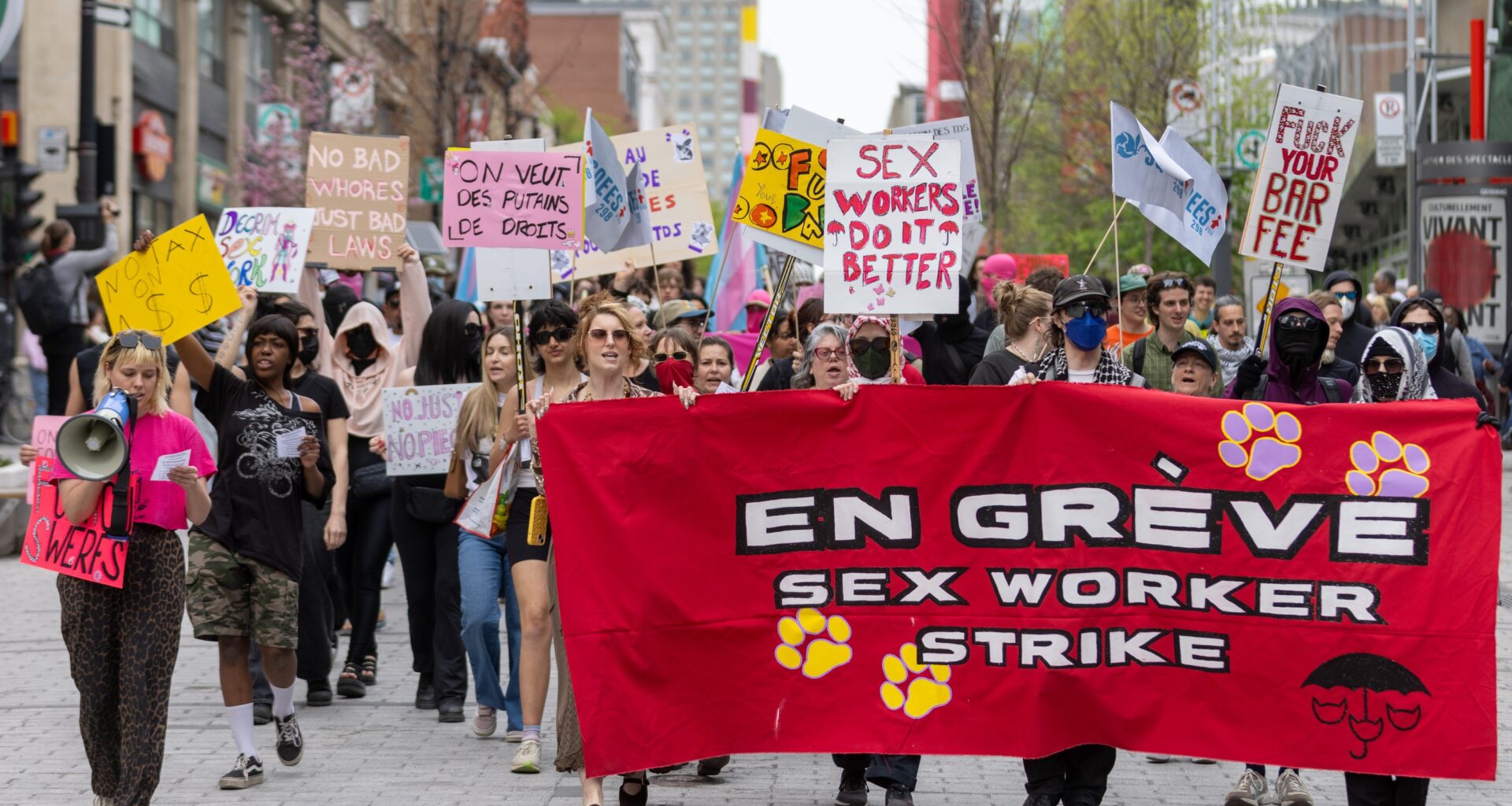 Sex workers and their supporters march along St-Urbain St. in downtown Montreal as part of strike action during the Canadian Grand Prix weekend in Montreal.