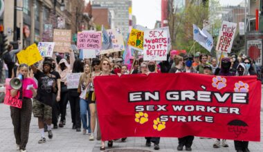 Sex workers and their supporters march along St-Urbain St. in downtown Montreal as part of strike action during the Canadian Grand Prix weekend in Montreal.