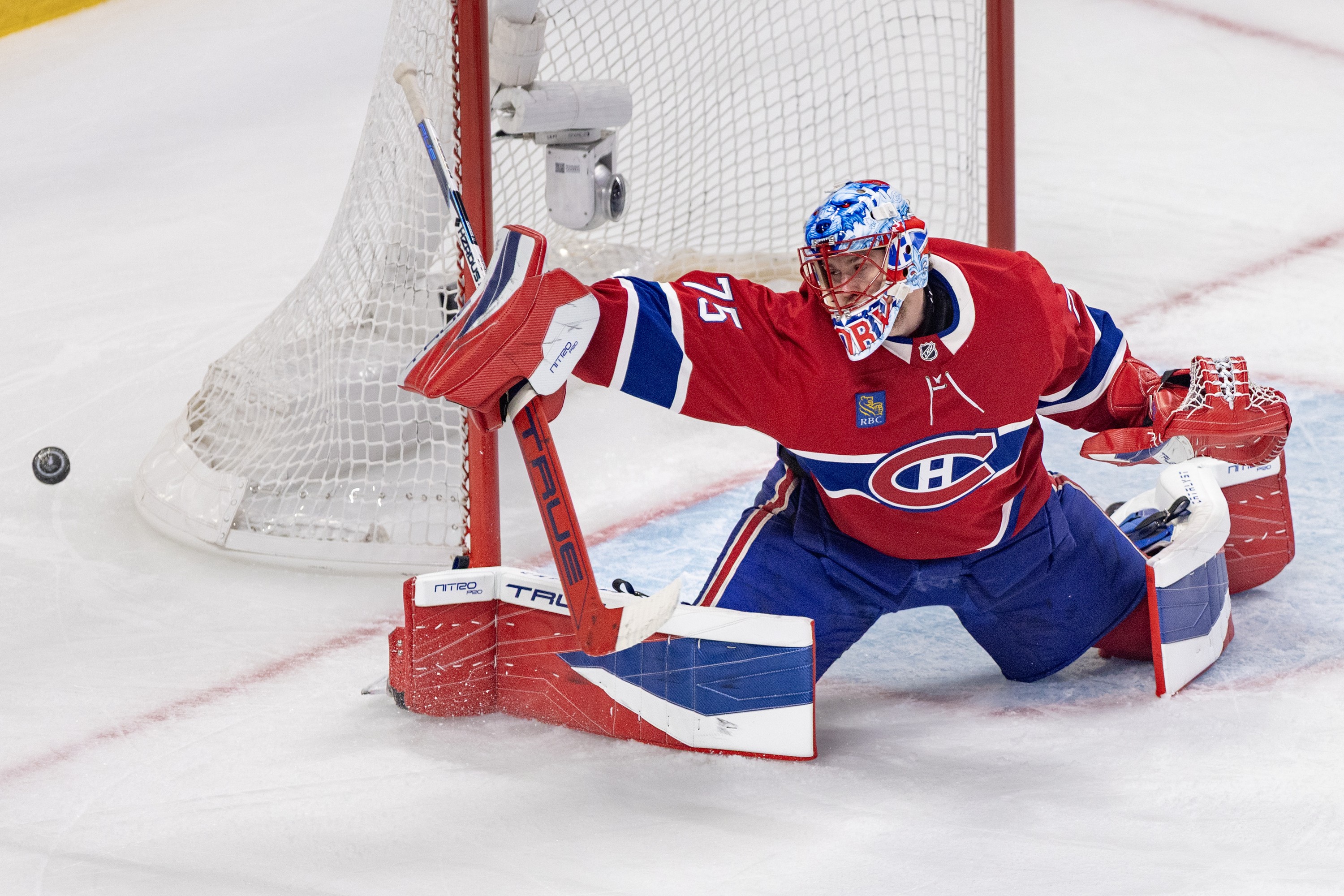 Canadiens' Jakub Dobes makes a blocker save