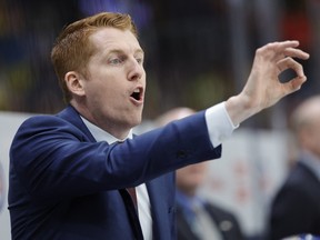 Team USA head coach David Carle gestures during the semifinal match at the IIHF world junior championship in 2024.