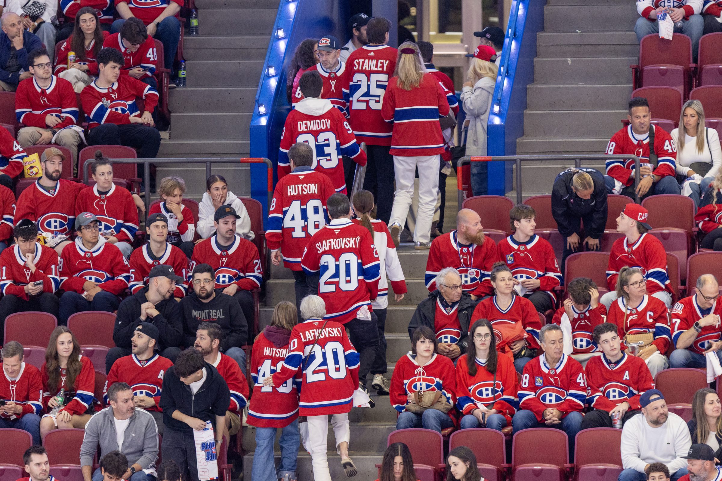 Canadiens fans head to the exits with more than six minutes remaining in the third period of the team's Game 4 loss to the Carolina Hurricanes  in Montreal on Wednesday.