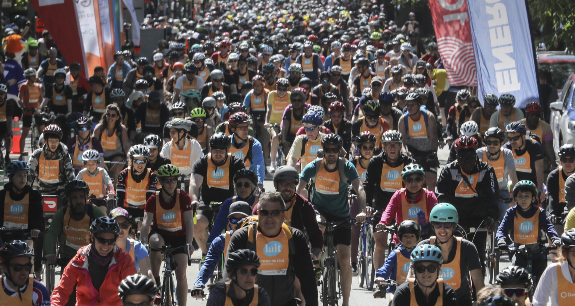 People depart on the Tour de l'Île from the Lafontaine Park area in Montreal.