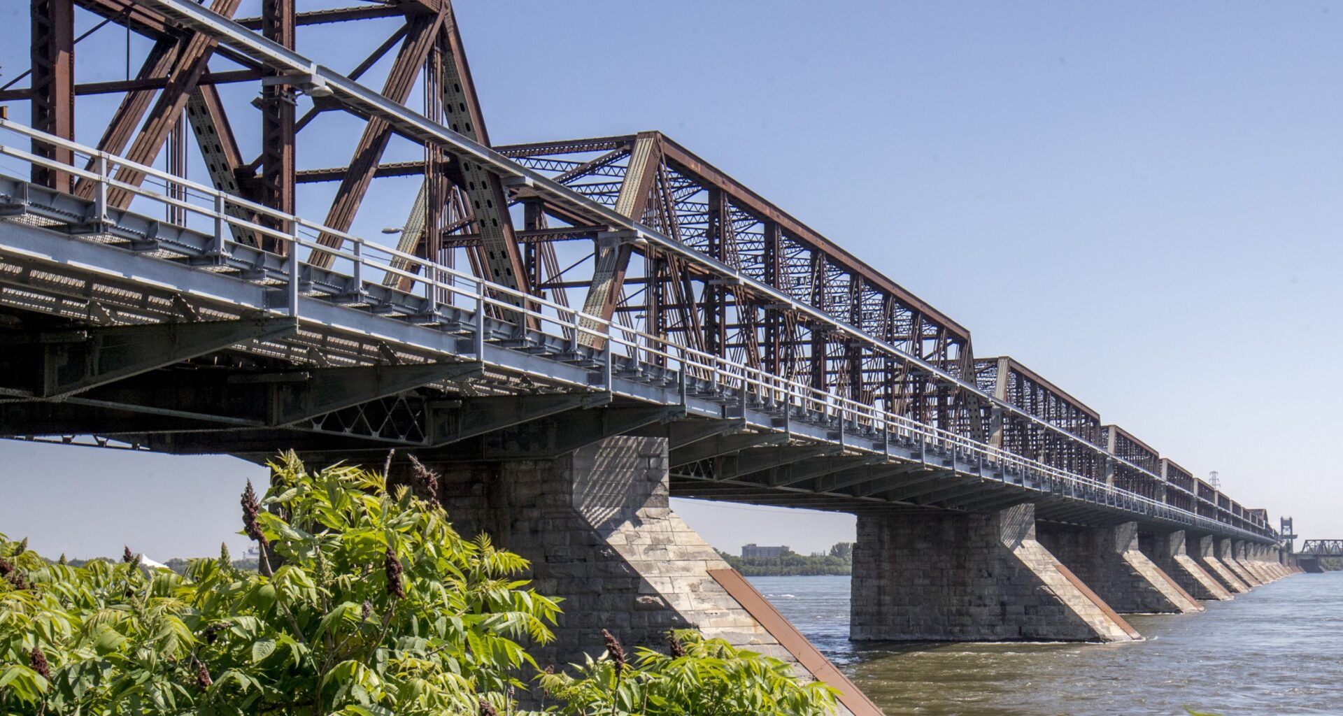 The Victoria Bridge as seen from the shore.