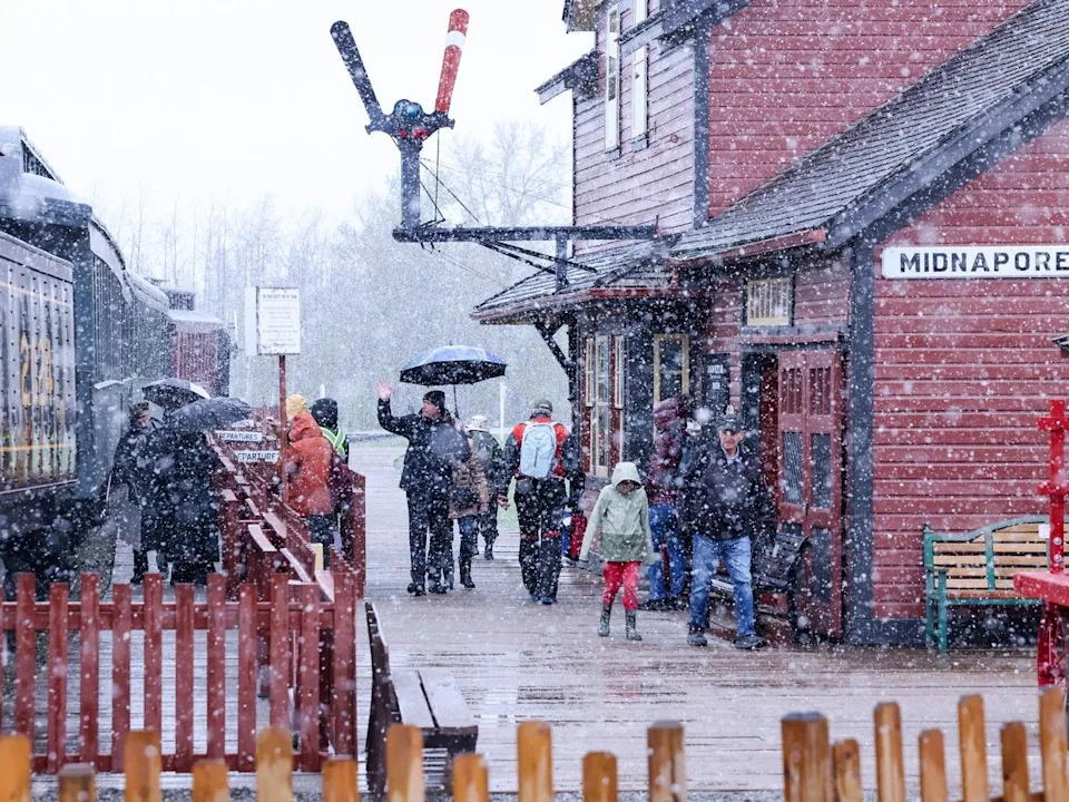 It was a snowy spring start to opening day at Heritage Park on Saturday.