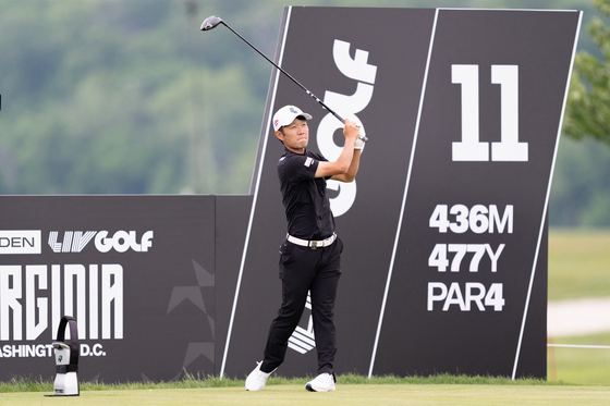 Yosuke Asaji hits a drive during the LIV Golf Virginia pro-am tournament at Trump National Golf Club in Sterling, Virginia, on May 6.  [GETTY IMAGES]