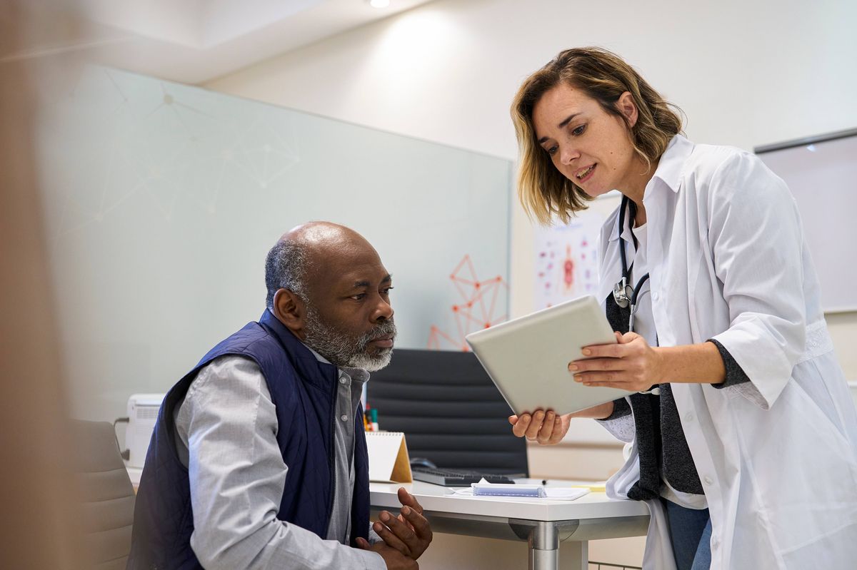 doctor dealing with patient