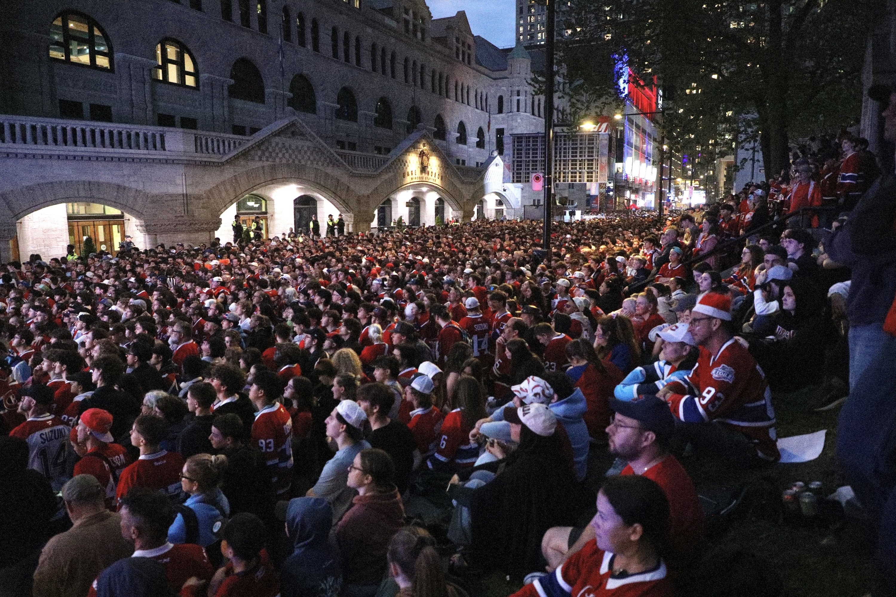 A small part of a huge crowd outside the Bell Centre watching on a big screen as the Canadiens were playing the Buffalo Sabres during Game 6.