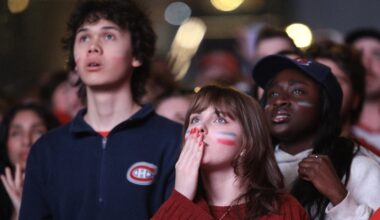 Fans watch on a screen as the Canadiens were playing the Buffalo Sabres during Game 6 in Montreal.