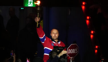 Former Canadiens goalie Halak carries torch to raucous ovation before playoff game