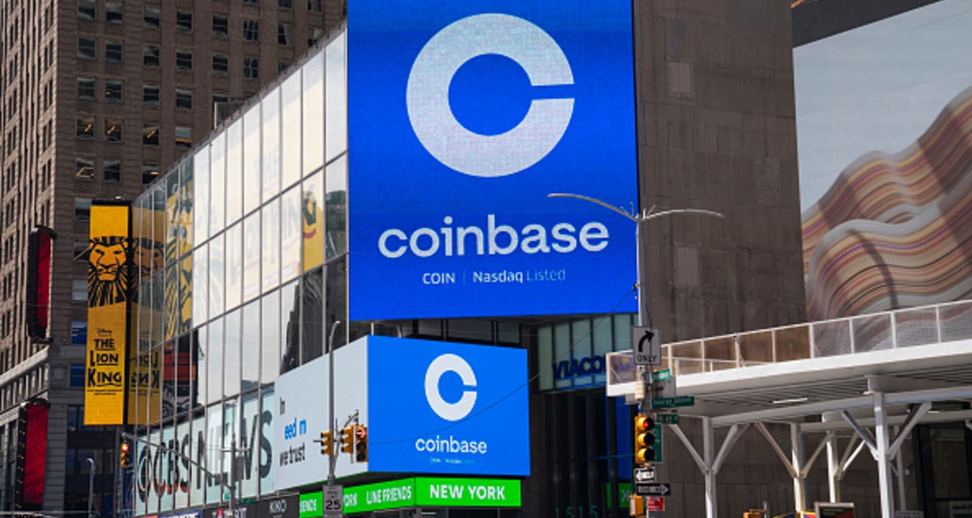 Coinbase cuts headcount by 14% citing AI acceleration. The shares are gaining