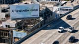 In an aerial view, a billboard advertising an artificial intelligence (AI) company is posted on Sept. 16, 2025 in San Francisco, California.