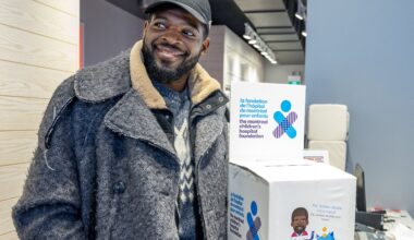 Former Canadiens star P.K. Subban picks up a box of cheques for the Montreal Children