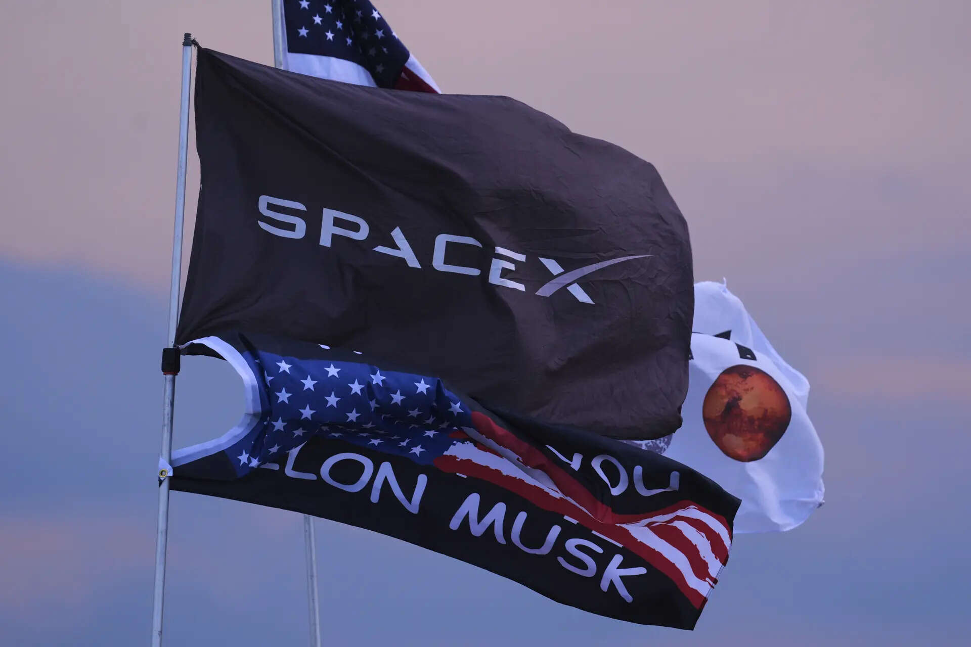 <p>Flags are posted near the site where SpaceX's mega rocket Starship was set to make a test flight from Starbase, Texas, Sunday, Aug. 24, 2025. </p>