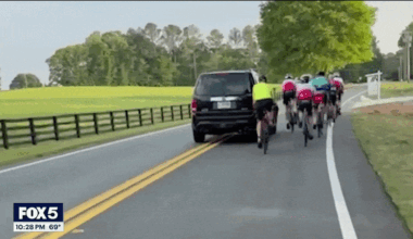 GIF of SUV hitting cyclist