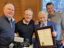Former Vancouver Canucks goaltender and Sportsnet broadcaster John Garrett is honoured by the City of Vancouver on Wednesday, May 10, 2023. Pictured are John Shorthouse, Mike Bradley, Garrett and Dan Murphy.
