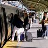 Travelers boarding an Acela train at Union Station in Washington, D.C.