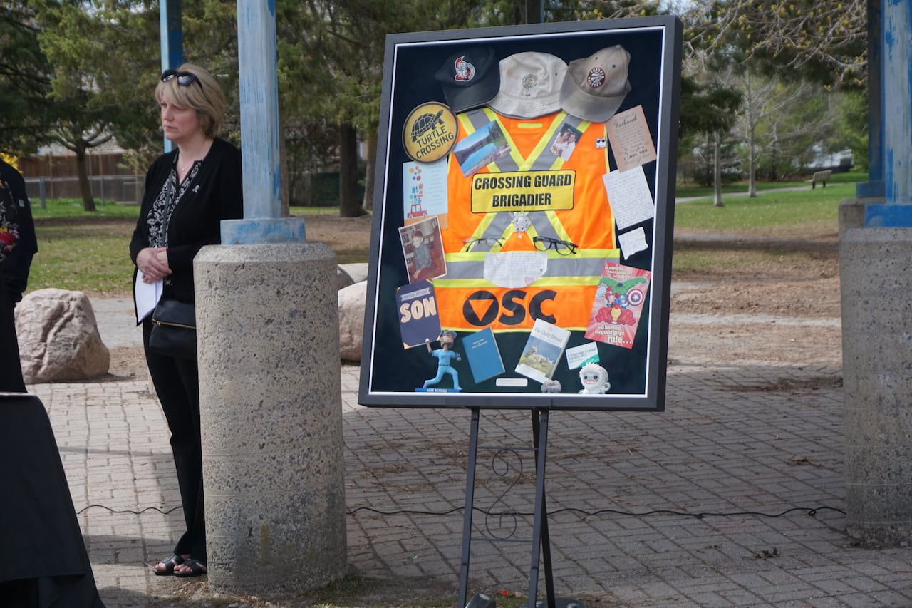 Memorabilia in a frame commemorating the life of a killed crossing guard