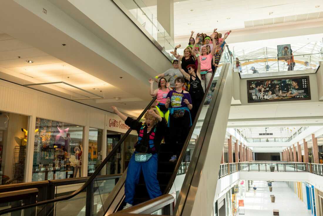 Krista Lee Catwood leads the Food Court 5000 mall walkers at the Lloyd Center food court on Sunday, April 26, 2026 in Portland, Ore.