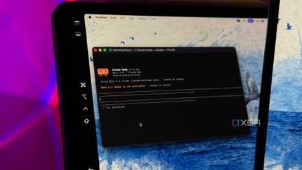 terminal window showing claude code on mac laptop with colorful purple and blue lighting