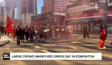 Large crowd marks red dress day in downtown Edmonton