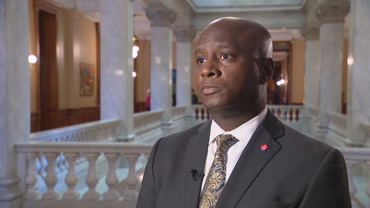 Marvin Alfred, president of Toronto transit union ATU Local 113, standing in the lobby of Queens Park in Toronto, facing the camera.