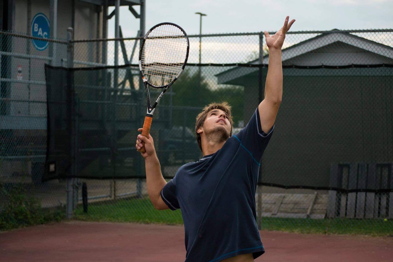 A man playing tennis