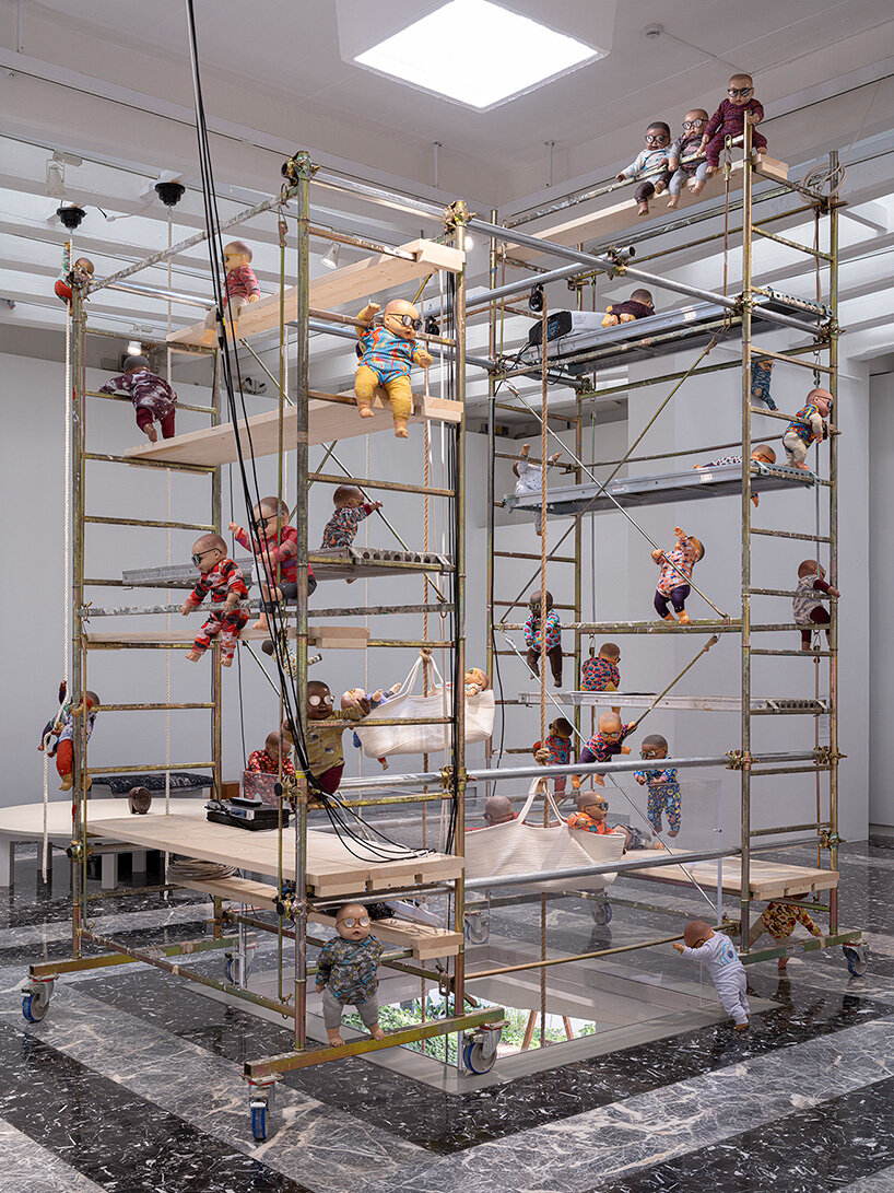 208 baby dolls animate japan pavilion in ei arakawa-nash's playful ode to care - 4
